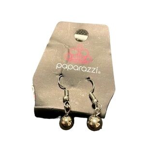 Small silver colored earrings new with original packaging